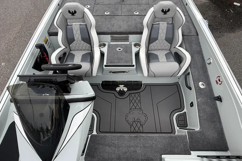 Slide: The Image of 2027 Phoenix 921 Elite X II boat interior with dual seats and sleek design. - 10