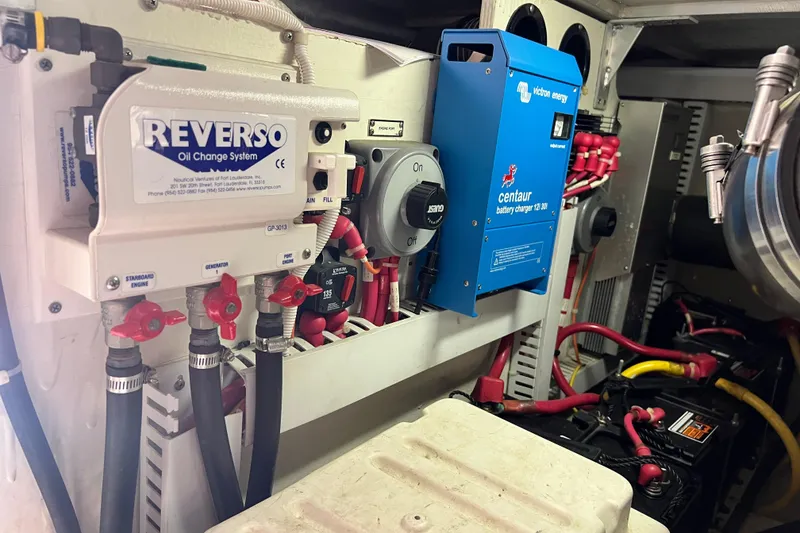 Slide: The Image of Engine room of 2003 Carver 450 Voyager Pilothouse with Reverso oil change system. - 53