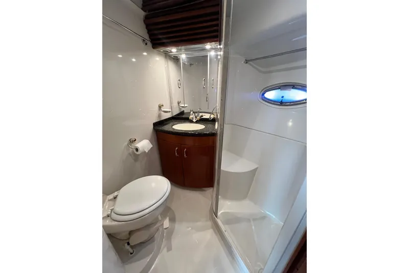 Slide: The Image of Luxurious bathroom in 2003 Carver 450 Voyager Pilothouse yacht with modern fixtures. - 33