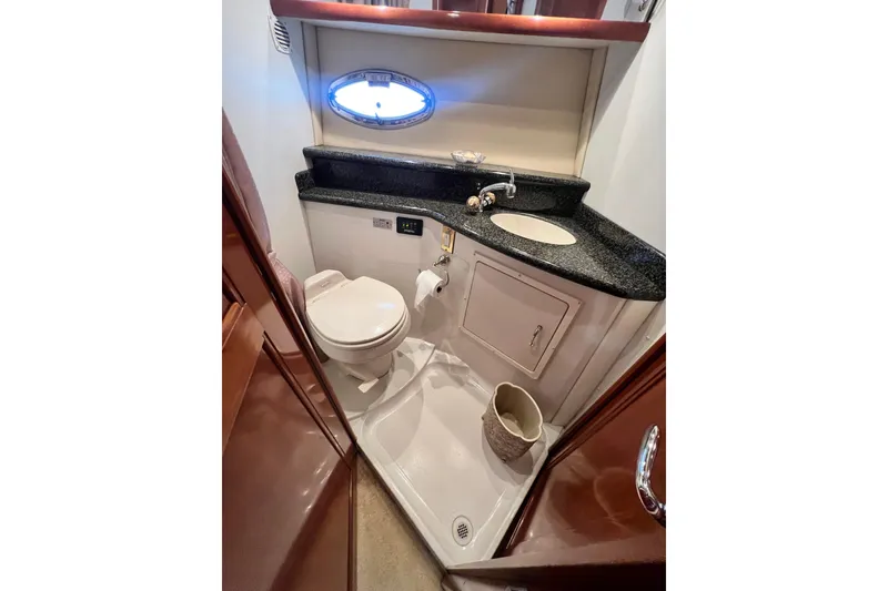 Slide: The Image of Bathroom interior of 2003 Carver 450 Voyager Pilothouse with sink and toilet. - 36