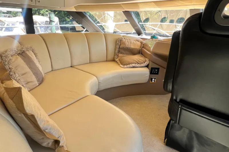 Slide: The Image of Luxurious interior of 2003 Carver 450 Voyager Pilothouse with plush seating and cushions. - 22
