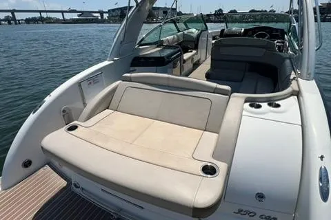 Slide: The Image of 2016 Formula 350 Crossover Bowrider I/O on water, showcasing spacious seating and sleek design. - 17