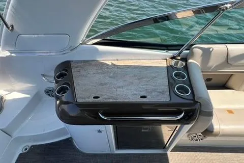 Slide: The Image of 2016 Formula 350 Crossover Bowrider I/O interior with seating and cup holders. - 14