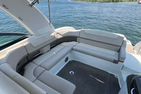Slide: The Image of 2016 Formula 350 Crossover Bowrider I/O with spacious seating on a serene lake. - 19