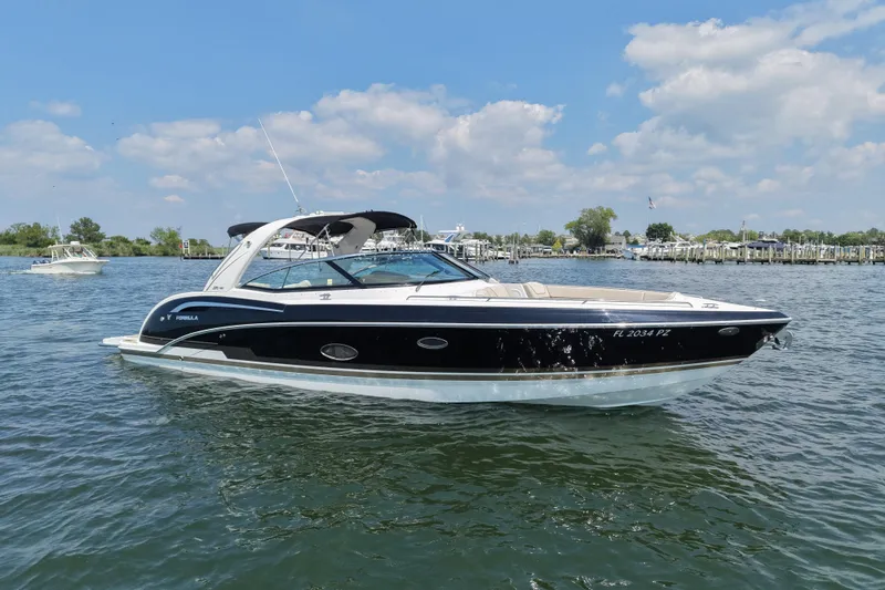 The Image of 2016 Formula 350 Crossover Bowrider I/O on water, sunny day, scenic background. - 0