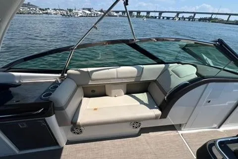 Slide: The Image of 2016 Formula 350 Crossover Bowrider I/O interior with seating, on a sunny day by the water. - 13