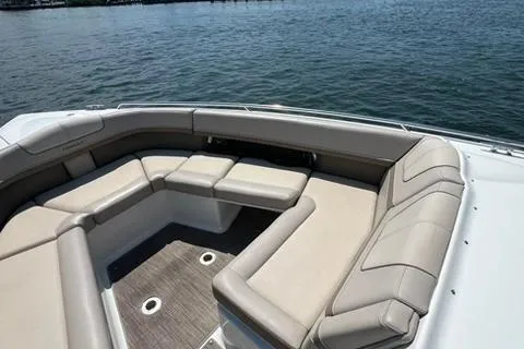 Slide: The Image of 2016 Formula 350 Crossover Bowrider I/O with spacious seating on calm waters. - 9