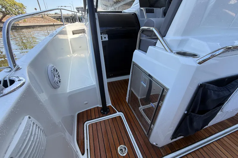 Slide: The Image of 2020 Jeanneau Leader 7.5 CC boat interior with teak flooring and modern amenities. - 25