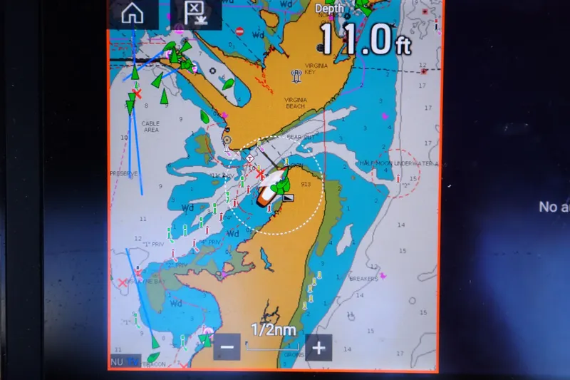 Slide: The Image of Navigation chart display on Island Packet 440, 2006 model, showing depth of 11.0 feet. - 34
