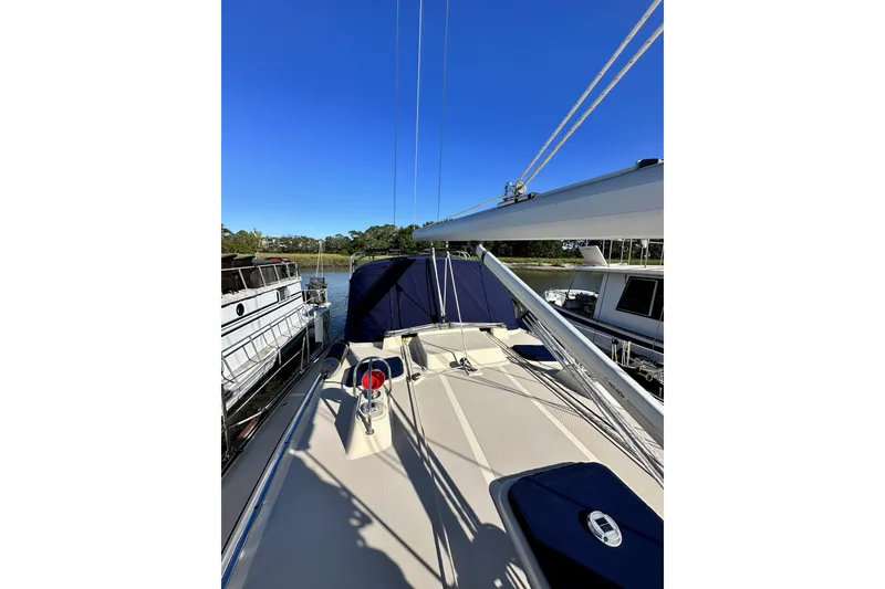 Slide: The Image of Sailboat deck view of 2006 Island Packet 440 under clear blue sky. - 20