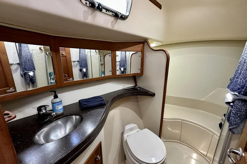 Slide: The Image of Luxurious bathroom in 2006 Island Packet 440 yacht with modern fixtures and ample storage. - 55