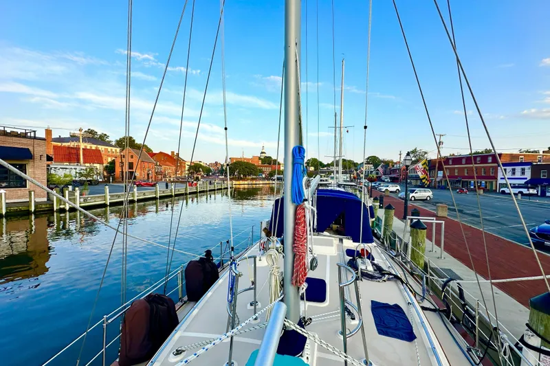 Slide: The Image of Sailboat docked in a scenic harbor, Island Packet 440, 2006 model. - 7