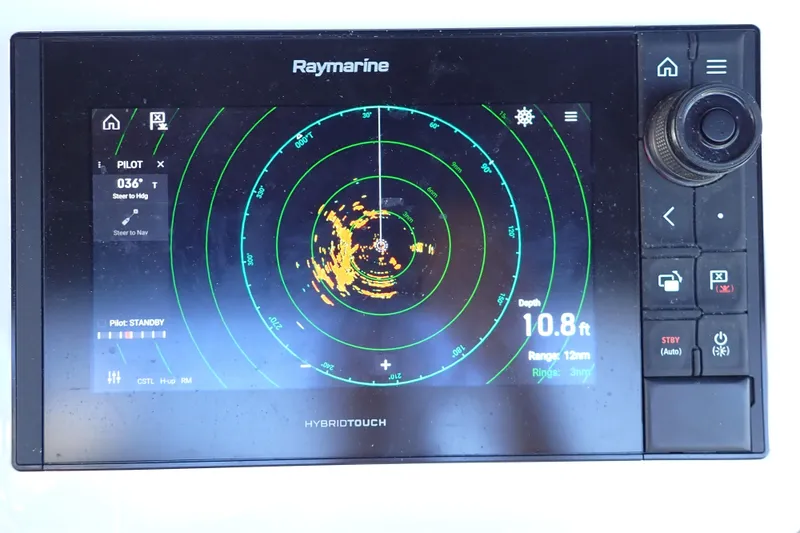 Slide: The Image of Raymarine HybridTouch display on 2006 Island Packet 440, showing radar and navigation data. - 33