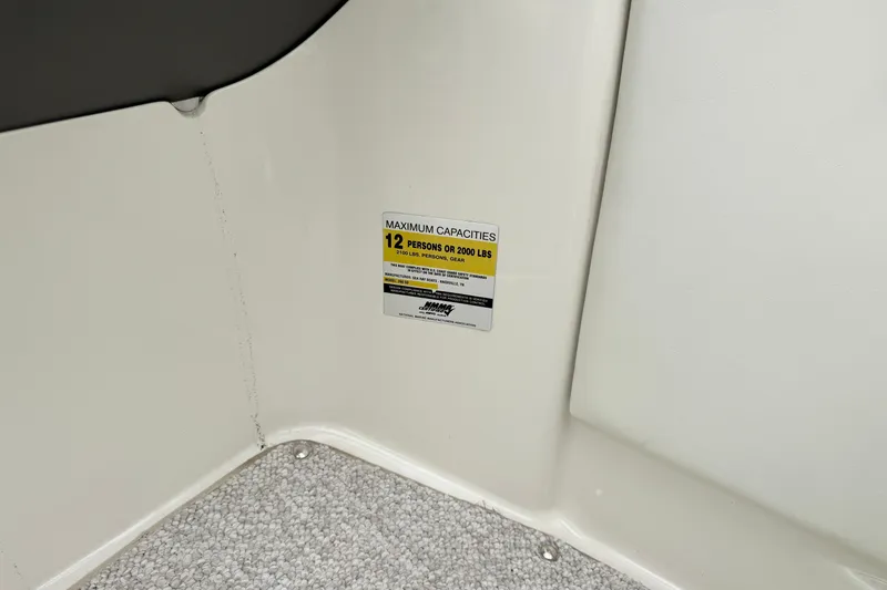 Slide: The Image of Capacity label on 2007 Sea Ray 260 Sundeck, indicating 12 persons or 2000 lbs limit. - 19