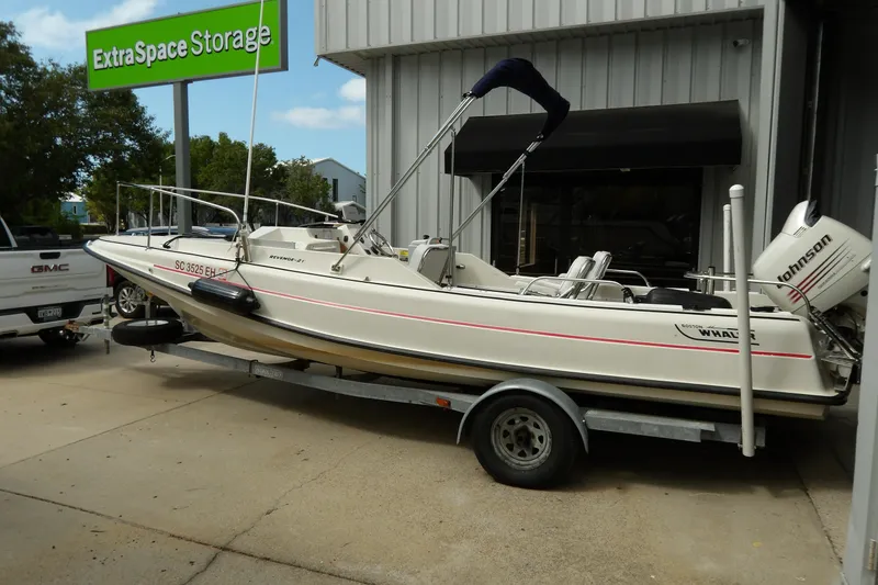 Slide: The Image of 1978 Boston Whaler 21 Revenge boat on trailer near Extra Space Storage facility. - 4