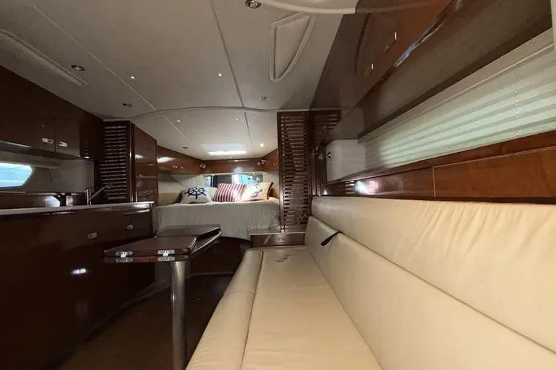 Slide: The Image of Luxurious interior of a 2011 Sea Ray Sundancer 370 yacht with elegant furnishings. - 25