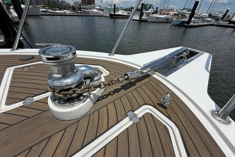 Slide: The Image of Deck of 2005 Ocean Alexander 48 Altus yacht with anchor chain and winch. - 15