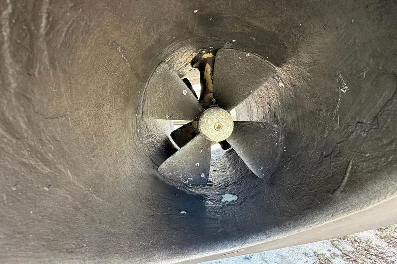 Slide: The Image of Close-up of a 2005 Ocean Alexander 48 Altus boat propeller in a tunnel. - 94