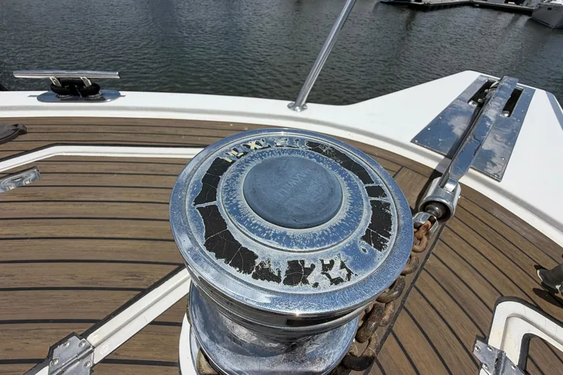Slide: The Image of Deck of 2005 Ocean Alexander 48 Altus yacht with winch and chain detail. - 16