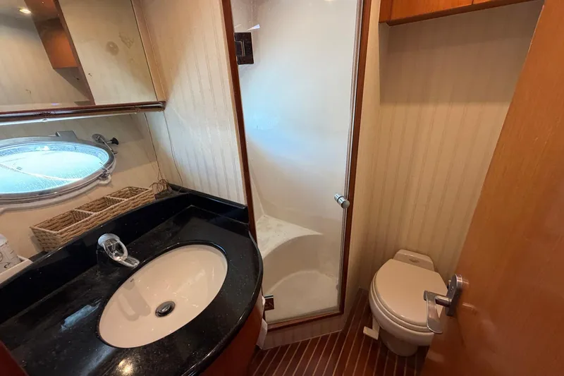 Slide: The Image of Luxurious bathroom in 2005 Ocean Alexander 48 Altus yacht with modern fixtures. - 56