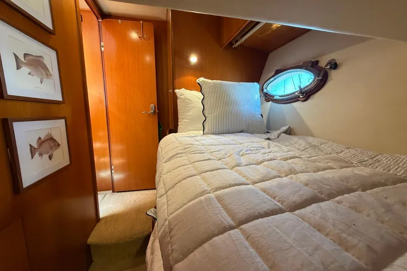 Slide: The Image of Cozy cabin interior of 2005 Ocean Alexander 48 Altus yacht with nautical decor. - 63
