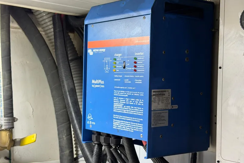 Slide: The Image of Victron Energy MultiPlus inverter in 2005 Ocean Alexander 48 Altus yacht engine room. - 90