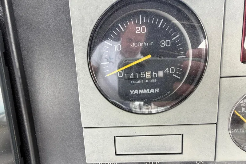 Slide: The Image of Yanmar engine hours gauge showing 4159 hours on a 2005 Ocean Alexander 48 Altus. - 79