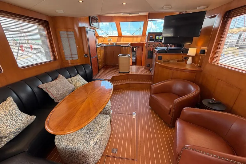 Slide: The Image of Luxurious interior of 2005 Ocean Alexander 48 Altus yacht with elegant seating and wood finishes. - 38