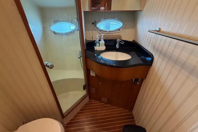 Slide: The Image of Luxurious bathroom in 2005 Ocean Alexander 48 Altus yacht with shower and vanity. - 64