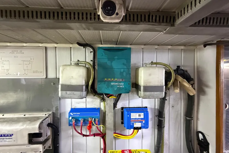 Slide: The Image of Electrical system components in a 2005 Ocean Alexander 48 Altus yacht engine room. - 92