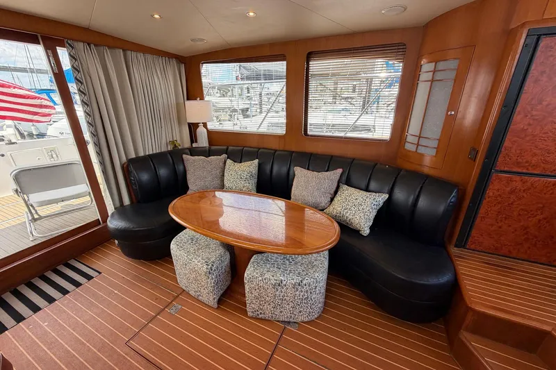Slide: The Image of Luxurious interior of 2005 Ocean Alexander 48 Altus yacht with elegant seating and table. - 40