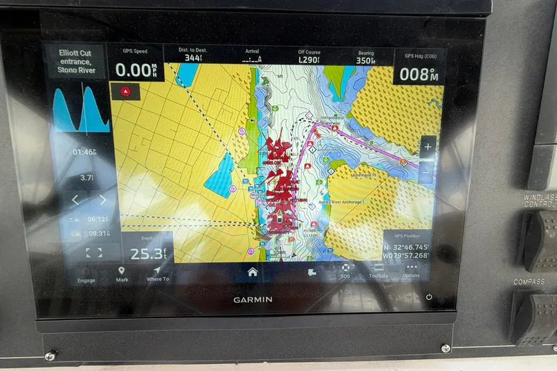 Slide: The Image of Garmin navigation display on 2005 Ocean Alexander 48 Altus yacht, showing map and coordinates. - 66
