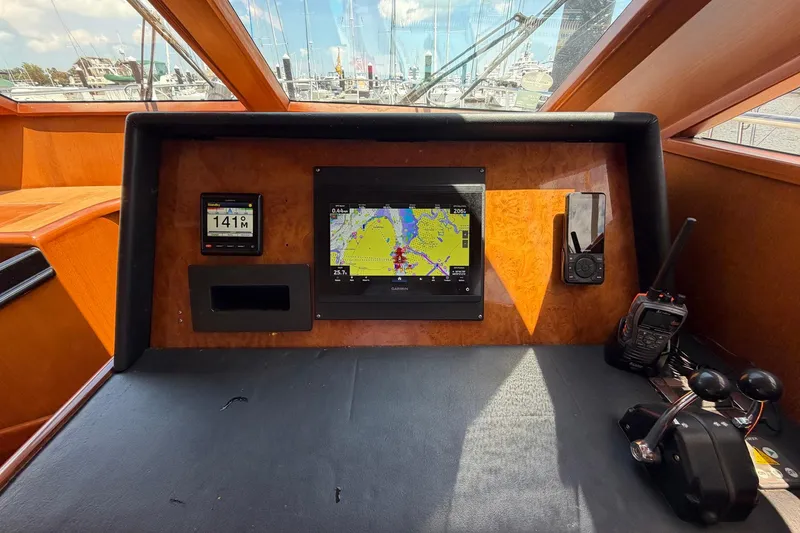 Slide: The Image of Cockpit of 2005 Ocean Alexander 48 Altus with navigation equipment and controls. - 50