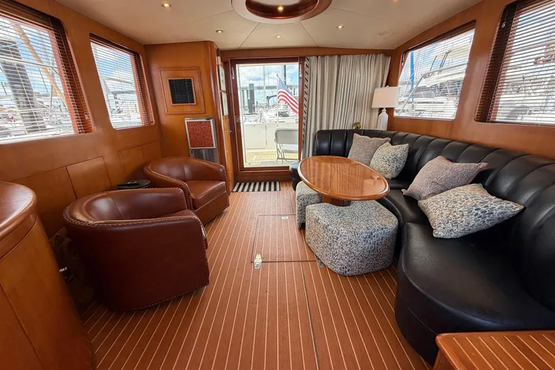Slide: The Image of Luxurious interior of 2005 Ocean Alexander 48 Altus yacht with leather seating and wooden accents. - 37