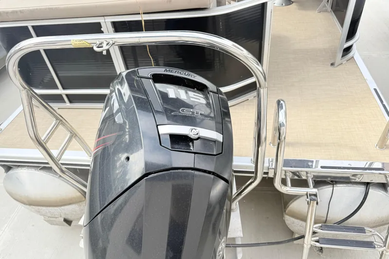 Slide: The Image of 2017 Harris Super Sunliner 200 with Mercury 115 outboard motor, rear view. - 3