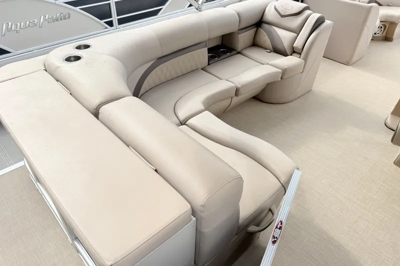 Slide: The Image of Luxurious seating on a 2017 Harris Super Sunliner 200 pontoon boat, featuring beige upholstery. - 5