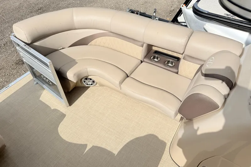 Slide: The Image of Luxurious seating on 2017 Harris Super Sunliner 200 pontoon boat with cup holders. - 9