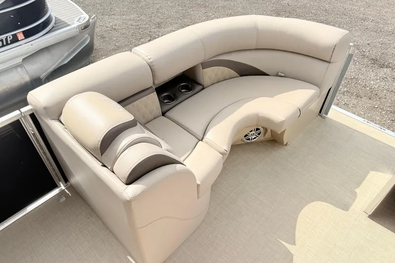 Slide: The Image of Luxurious seating on a 2017 Harris Super Sunliner 200 pontoon boat with cup holders. - 14