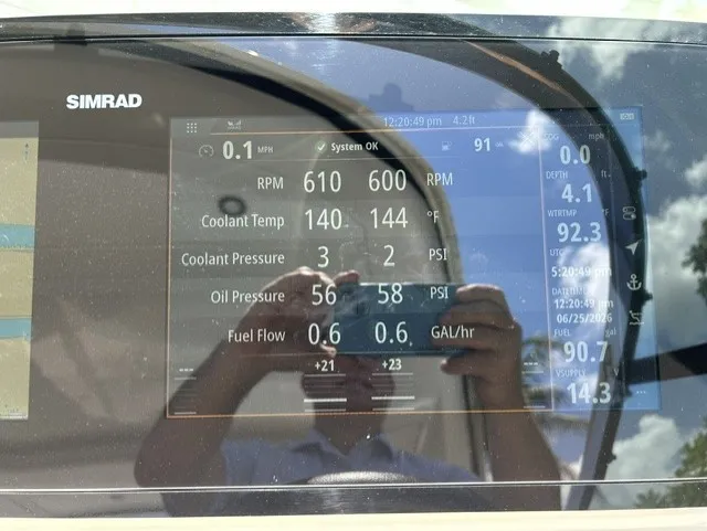 Slide: The Image of Simrad display on a Sea Ray SLX 310 Outboard showing engine and fuel data. - 22
