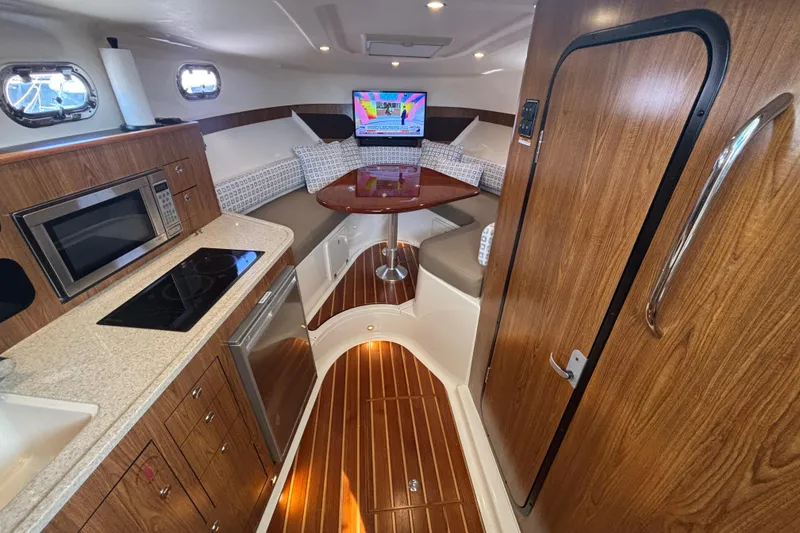 Slide: The Image of 2012 Pursuit 345 OS Interior view from entryway - 35
