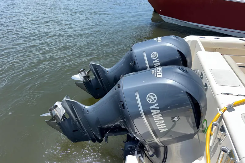 Slide: The Image of 2012 Pursuit 345 OS Yamaha Outboards getting flushed with fresh water - 28