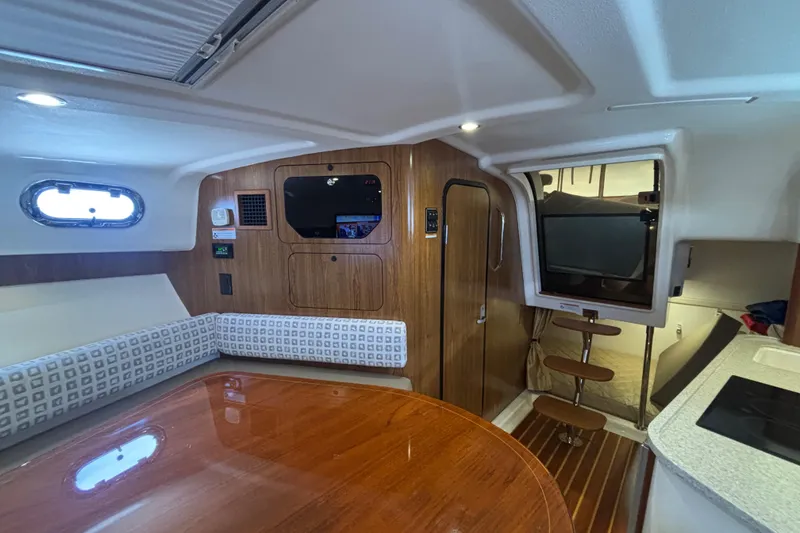 Slide: The Image of 2012 Pursuit 345 OS Aft View from port side of settee  - 41