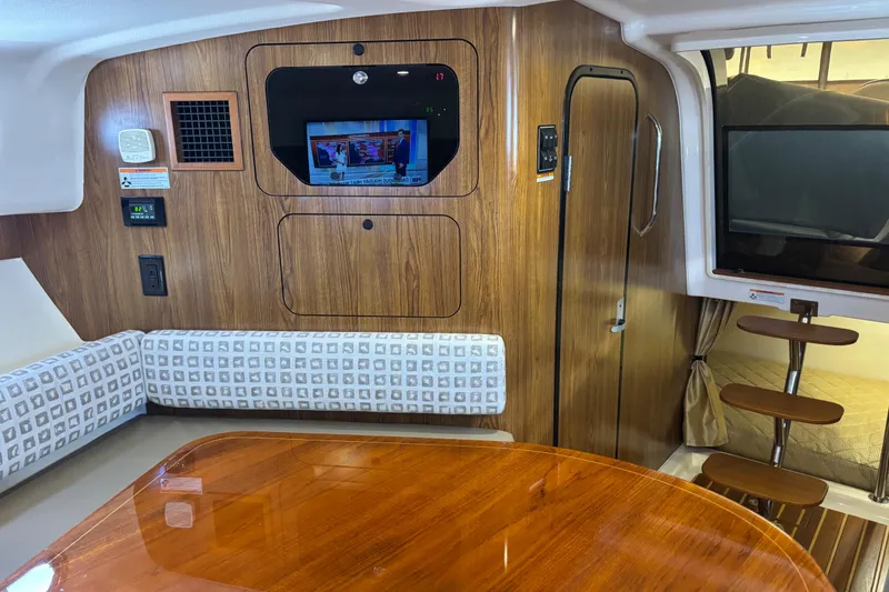 Slide: The Image of 2012 Pursuit 345 OS Aft View from port side of settee  - 42