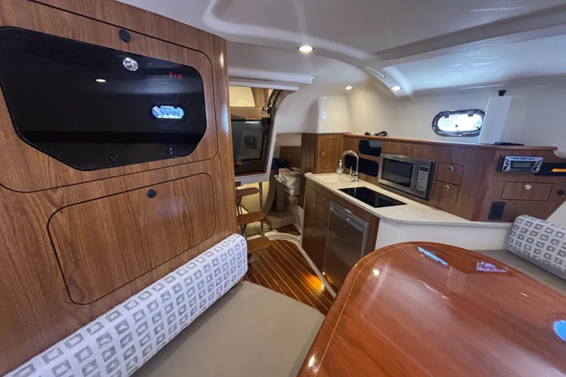 Slide: The Image of 2012 Pursuit 345 OS View Aft from starboard side of forward settee - 39