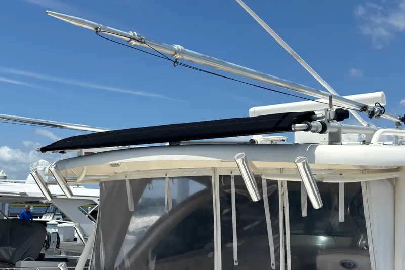 Slide: The Image of 2012 Pursuit 345 OS Rupp Outriggers/Rod Holders/Cockpit Shade Cover - 24