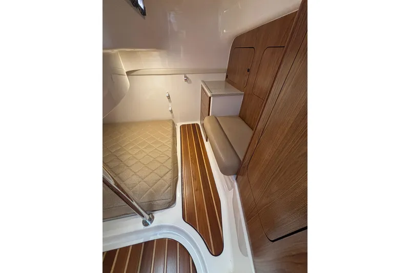 Slide: The Image of 2012 Pursuit 345 OS Mid Cabin Entryway/Seat/Drawer Storage - 55