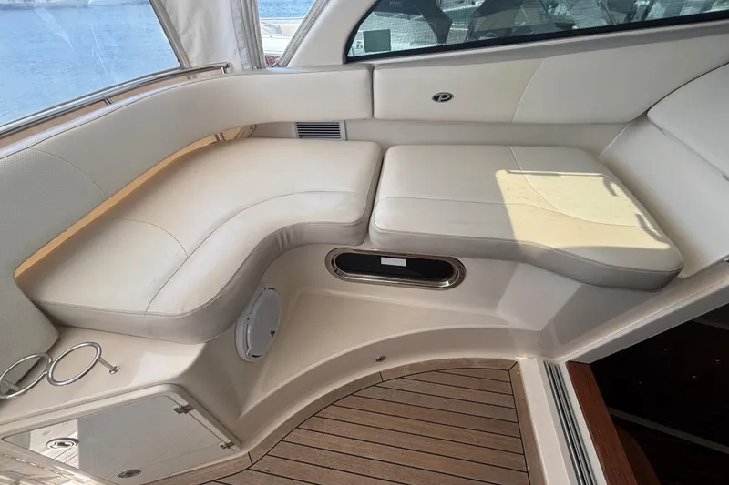 Slide: The Image of 2012 Pursuit 345 Offshore Companion seating to port side - 15