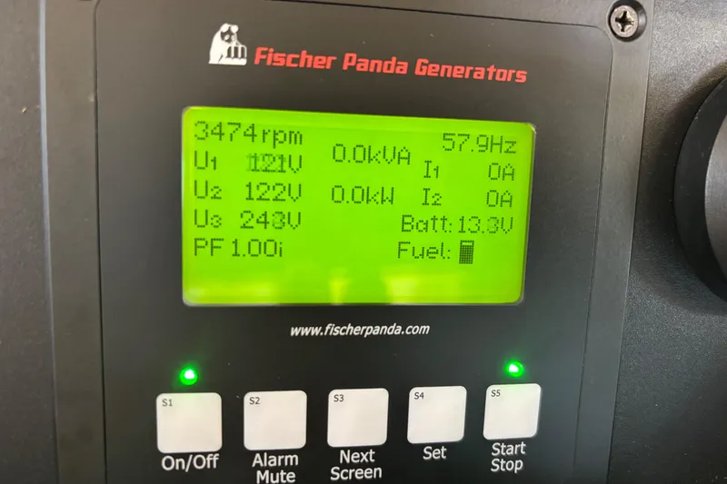 Slide: The Image of Fischer Panda generator display on a 2012 Pursuit OS 345 Offshore boat, showing operational metrics. - 33