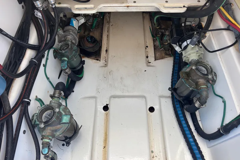 Slide: The Image of 2012 Pursuit 345 OS Mechanical Compartment/Bilge Access in cockpit sole - 29