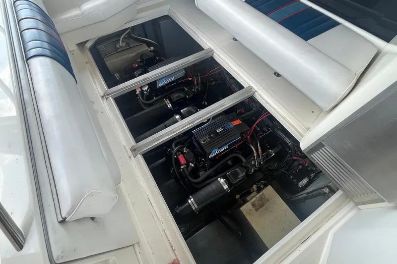 Slide: The Image of Engine compartment of a 1993 Sea Ray Sundancer 330 with MerCruiser engines visible. - 22